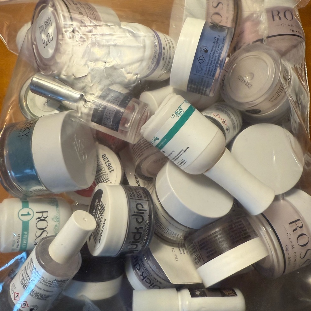 Assorted Nail Dip Powders and Liquids